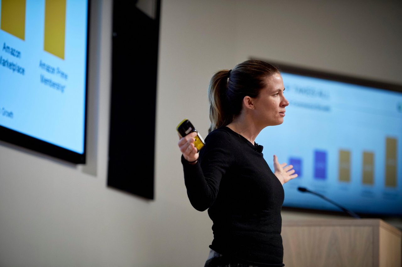 A Women Giving Speech on Digital Strategy That Brands Should Master for International Expansion